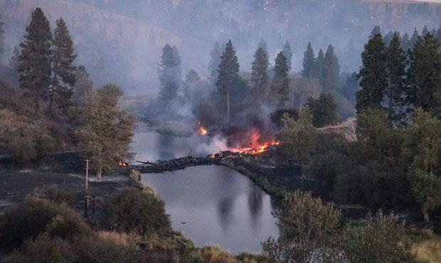 History in flames as fires decimate a railroad town and its iconic bridge